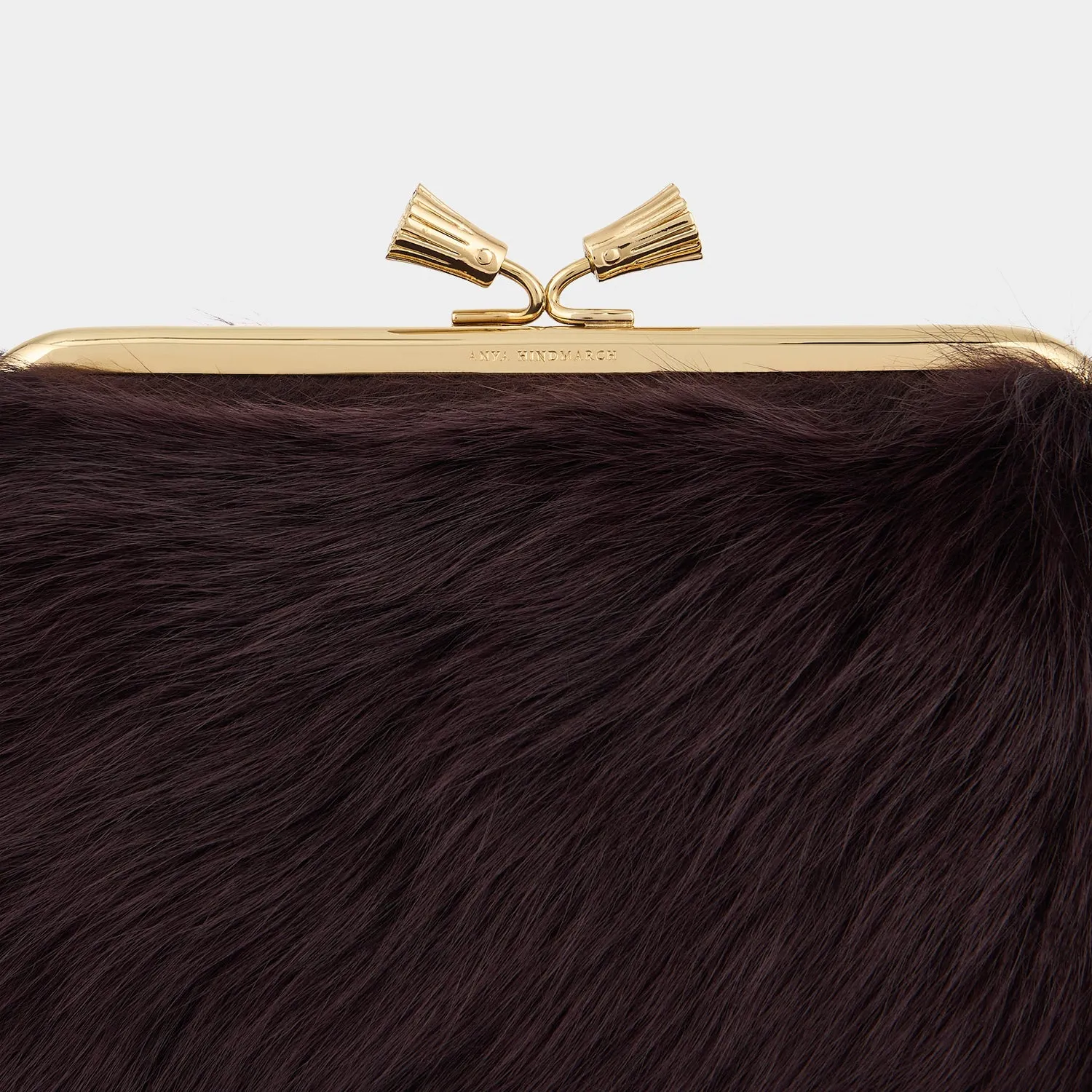 Maud Shearling Tassel Clutch