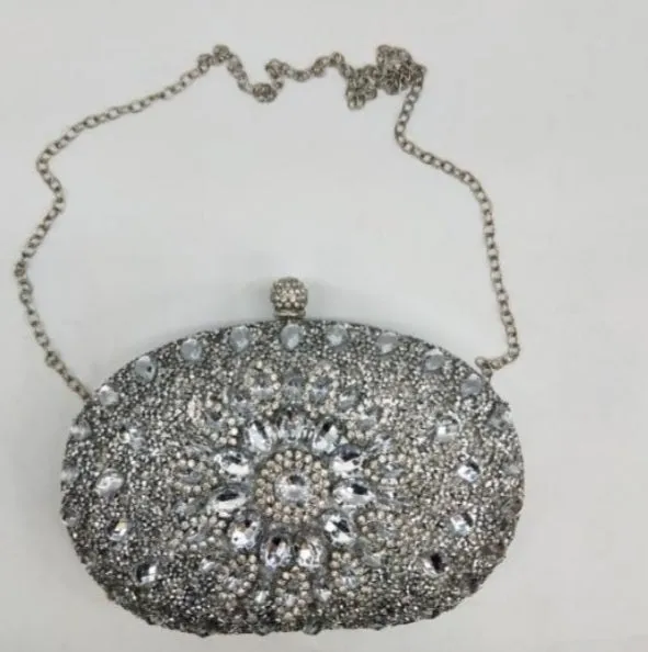 Oval gem Clutch bags